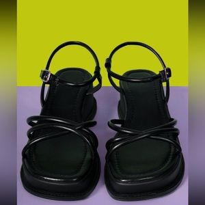 Black scrappy platform sandals